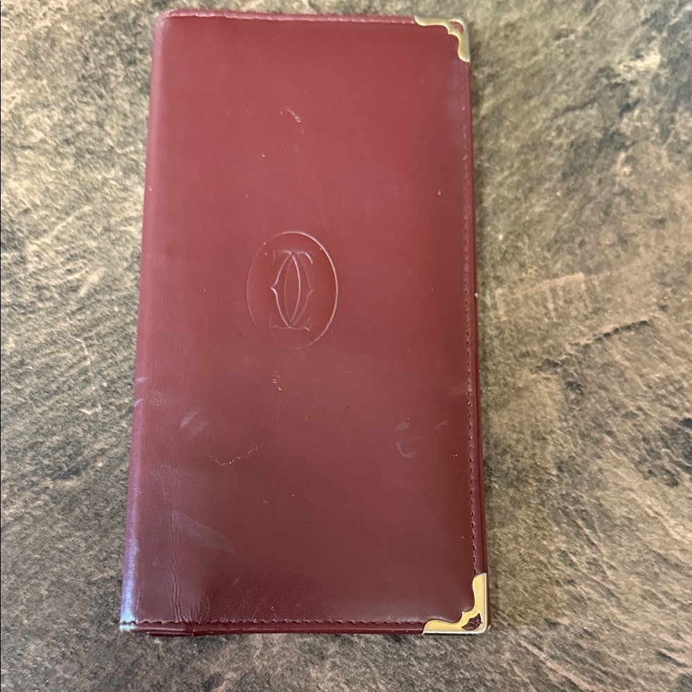 Cartier Burgundy Leather Wallet with Gold Accents